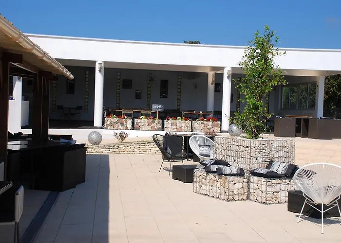 瑞贝利努公寓酒店 * 皮诺托里卡尔达雷洛